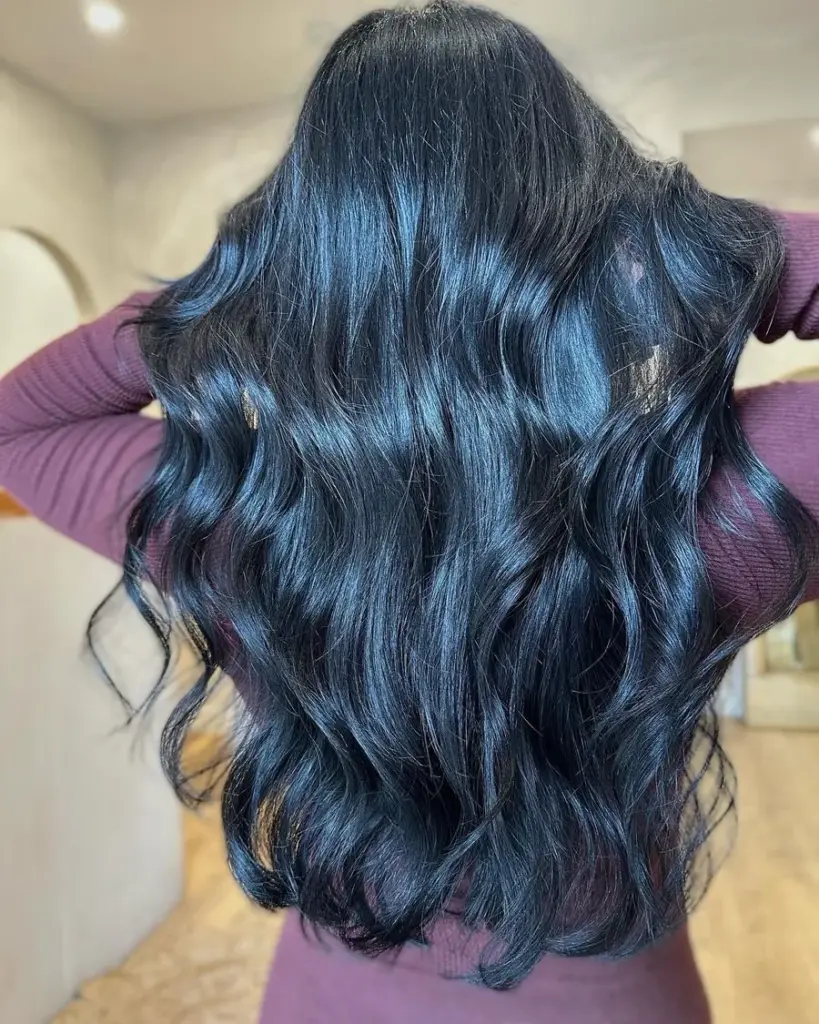 Blonde to glossy black colour change, by Sarah