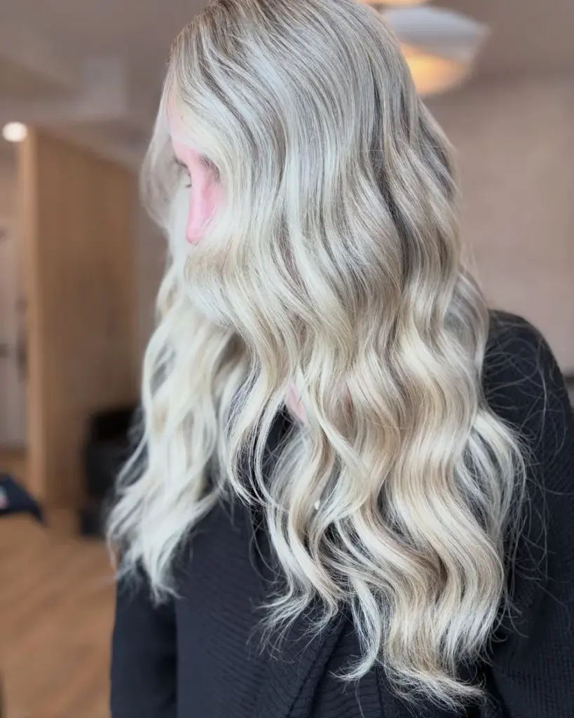 Bright blonde finished with an all over gloss, by Carly