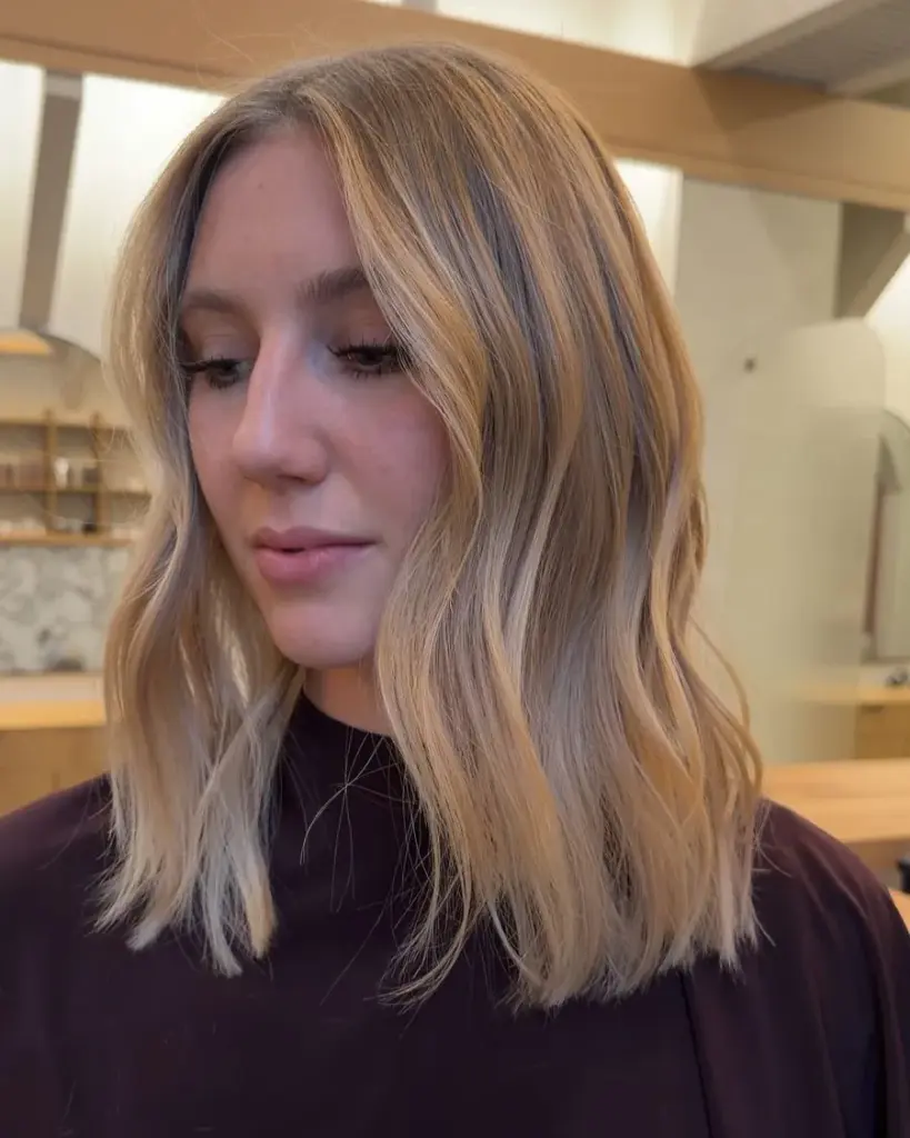 Lived-in blonde lob with soft movement, by Katie